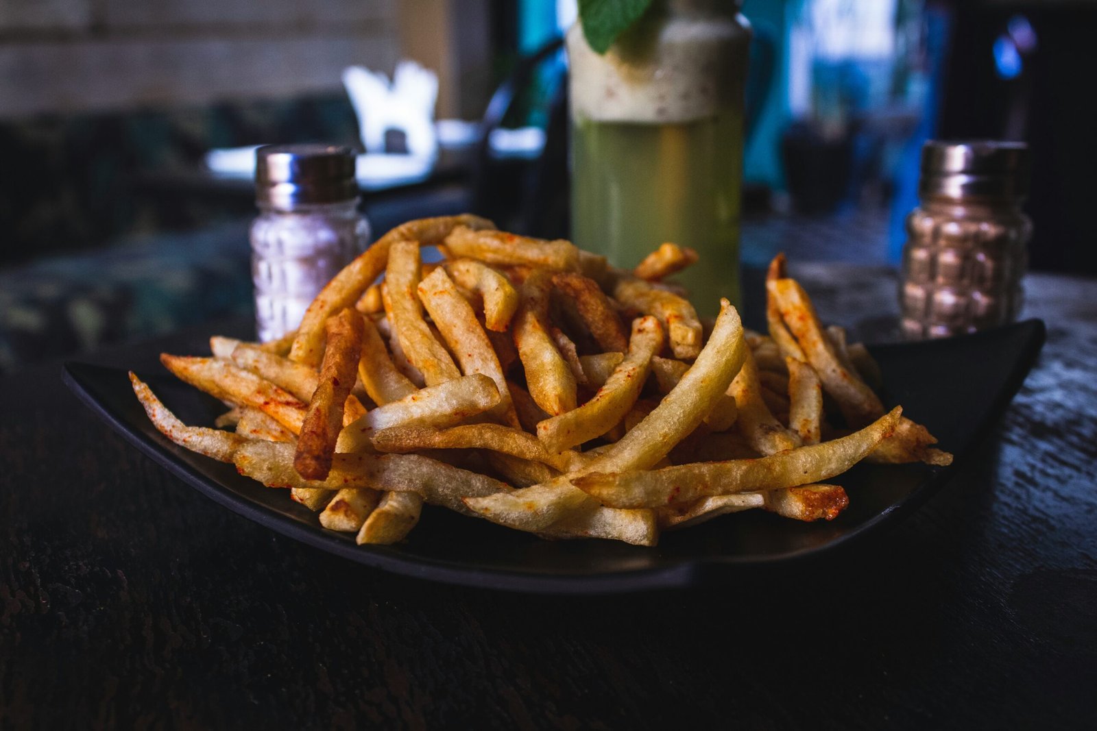 The History of French Fries: Exploring Gourmet Varieties, Potatoes, and Fixings