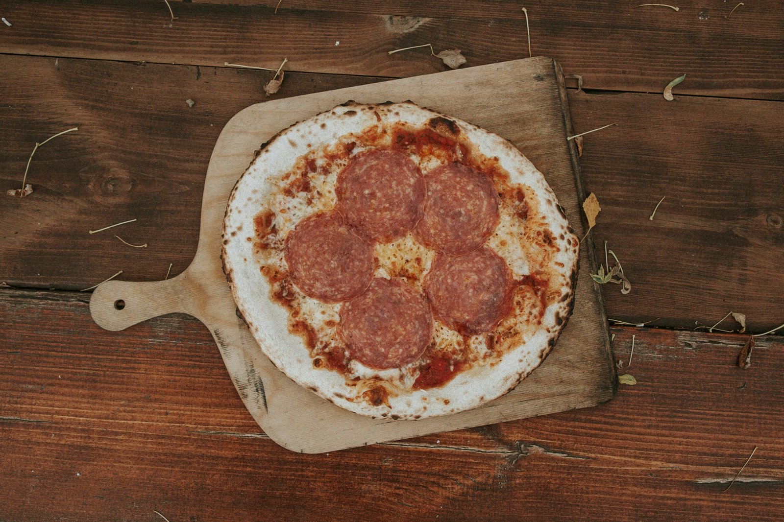 pizza on brown wooden tray